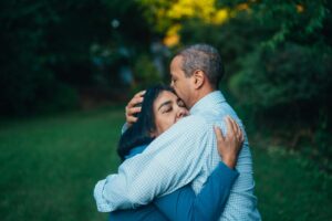 A couple hugging after getting sex addiction treatment in Idaho