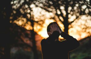 A stressed man before getting sex addiction treatment in Idaho