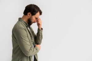 A sad man before getting sex addiction treatment in Idaho