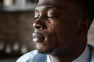 A sad man before getting sex addiction treatment in Idaho