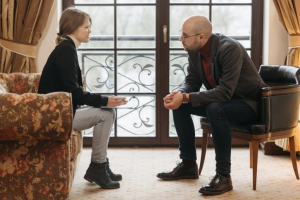 An image of two people talking