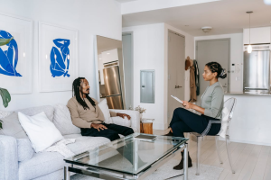 An image of a man talking to a therapist